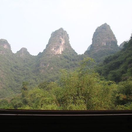 Отель Yangshuo Peaceful Valley Retreat Экстерьер фото