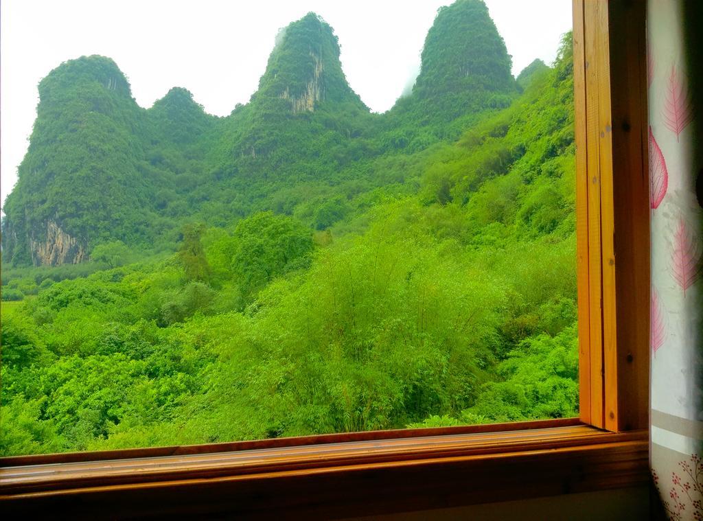 Отель Yangshuo Peaceful Valley Retreat Экстерьер фото