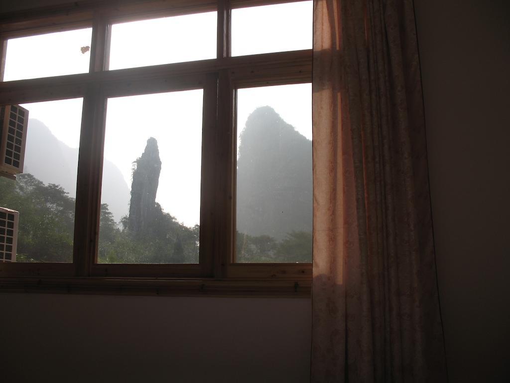 Отель Yangshuo Peaceful Valley Retreat Экстерьер фото