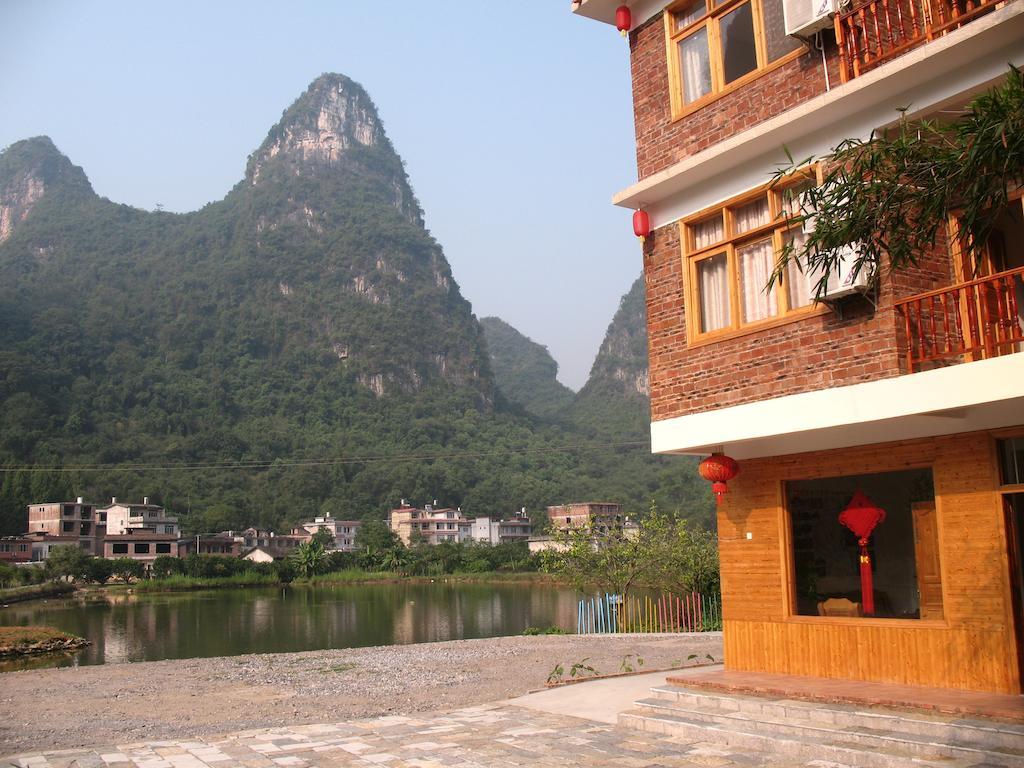 Отель Yangshuo Peaceful Valley Retreat Экстерьер фото