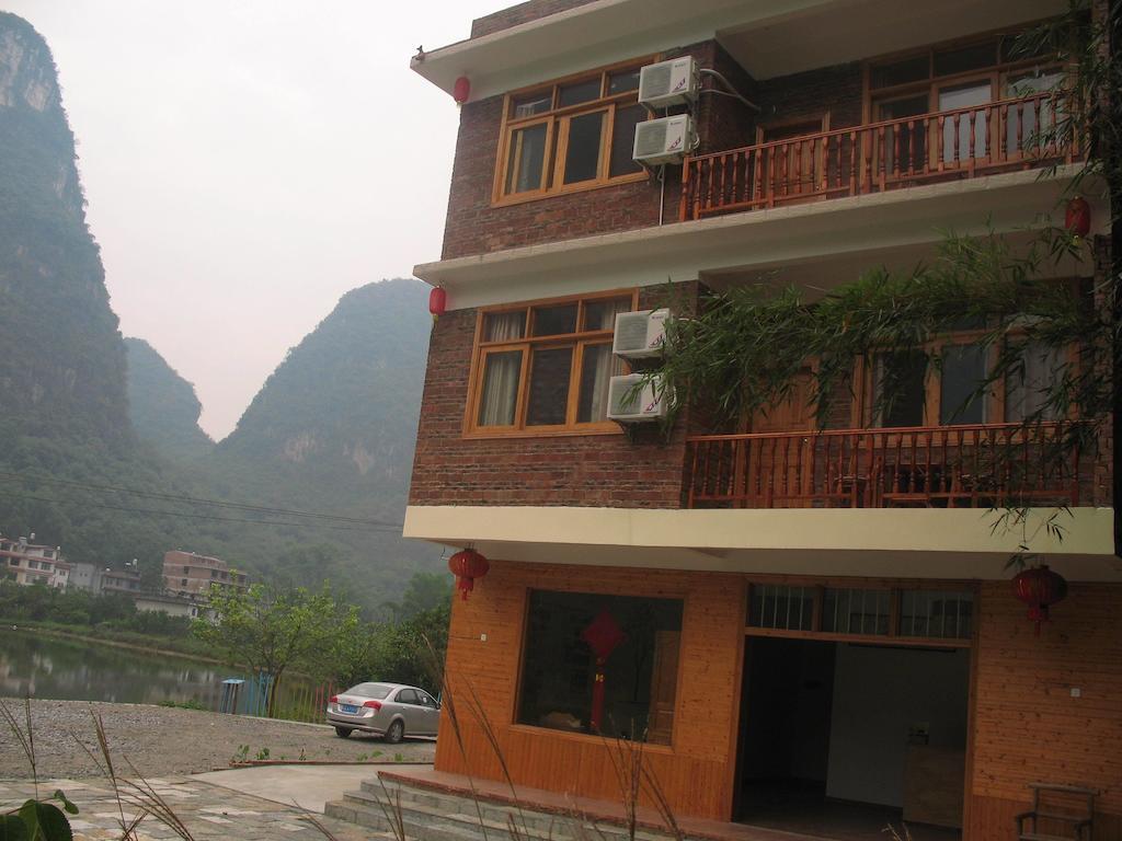 Отель Yangshuo Peaceful Valley Retreat Экстерьер фото