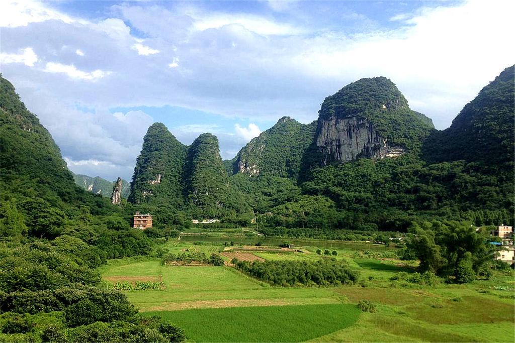 Отель Yangshuo Peaceful Valley Retreat Экстерьер фото