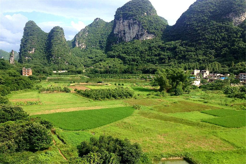 Отель Yangshuo Peaceful Valley Retreat Экстерьер фото